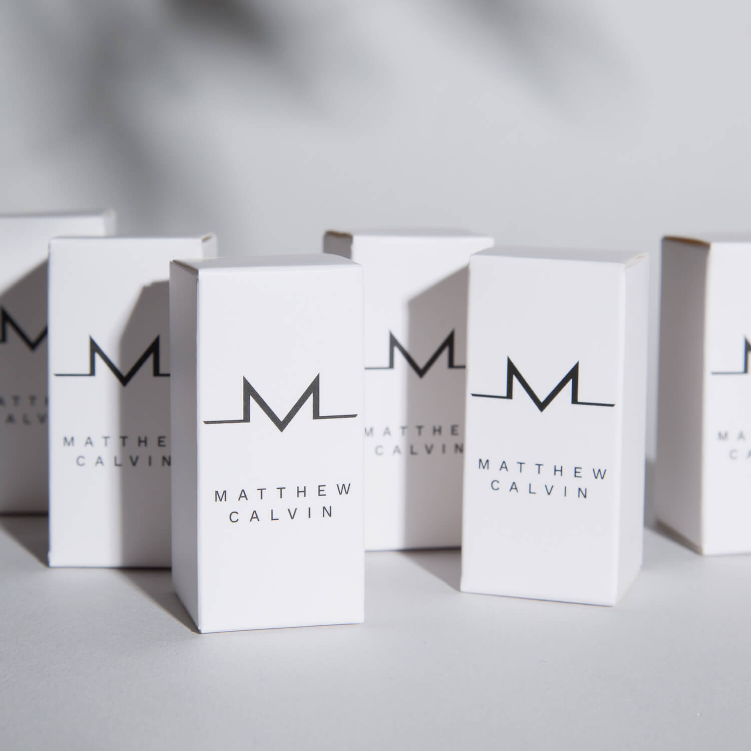 Matthew calvin branded white carton boxes