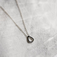 Close up of a Classic Teardrop Necklace in silver