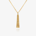 A tapered necklace by Matthew Calvin plated in gold