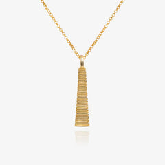 A tapered necklace by Matthew Calvin plated in gold