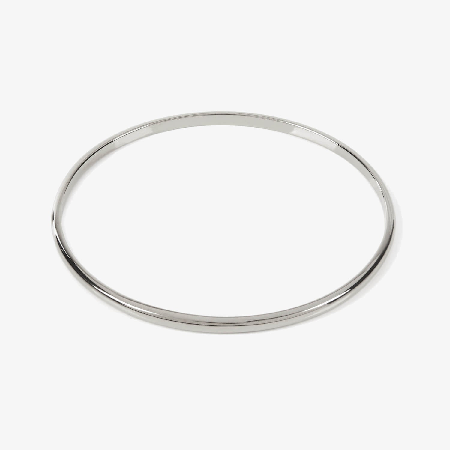 Plain silver bangle on a white background