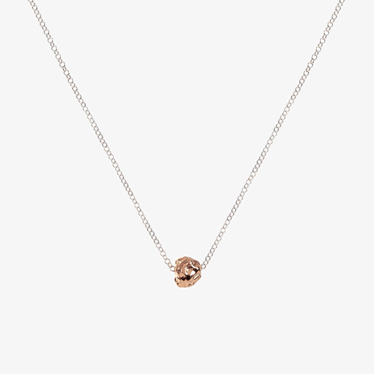 Rose gold large meteorite style textured charm on silver chain