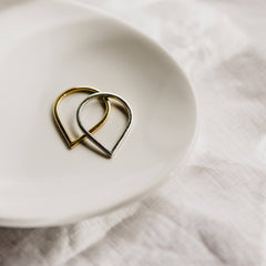 Two Point Rings on a ceramic background