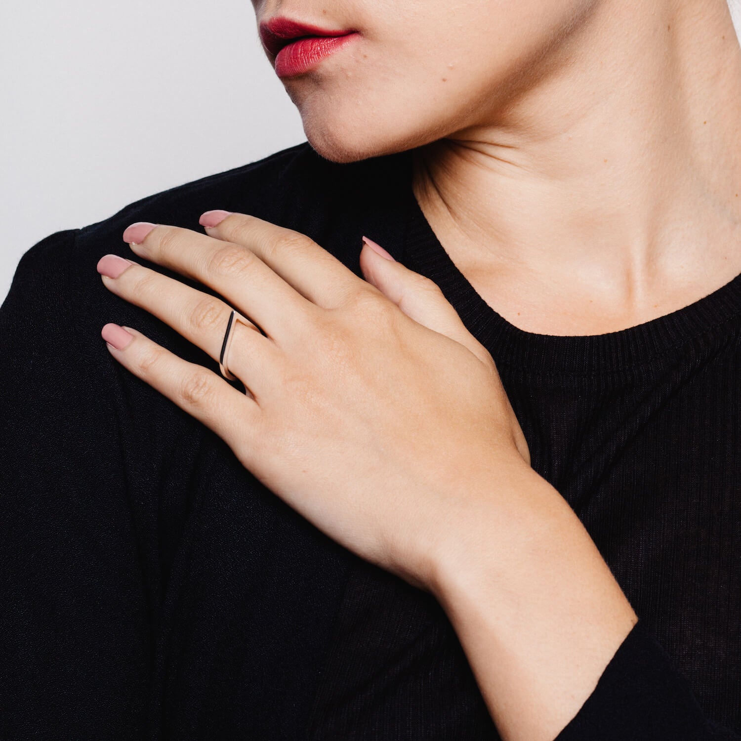 Model wearing a silver Point Ring