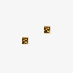 Small square studs in gold with textured detailing