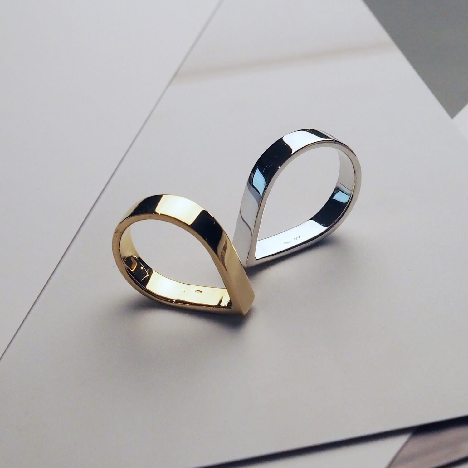 Two Wide Point Rings, one in silver and one in gold