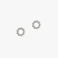 sterling silver beaded circular studs by matthew calvin on a white background