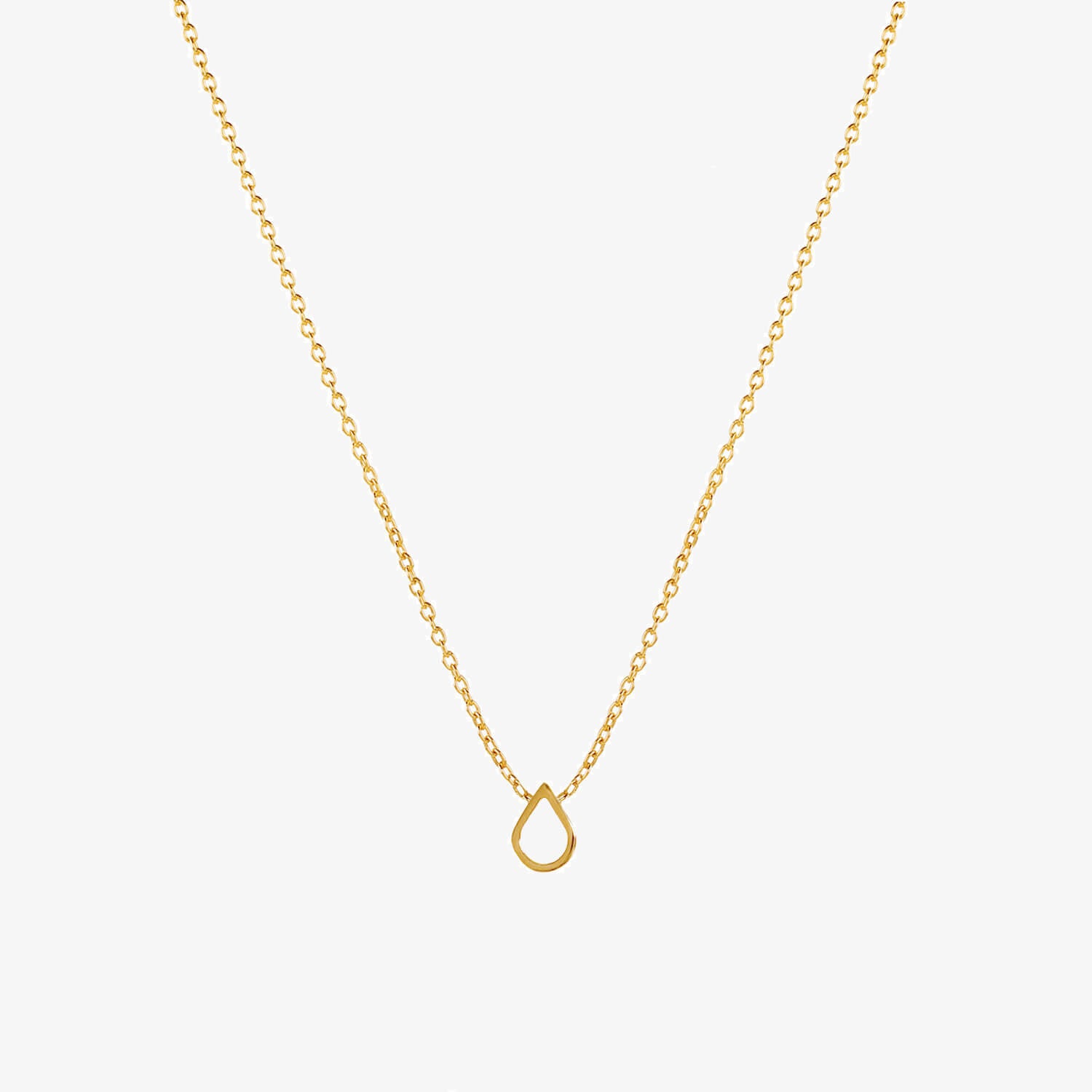 Small teardrop shaped charm on a chain in gold