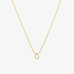Small teardrop shaped charm on a chain in gold