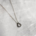 Close up of a Classic Teardrop Necklace in silver