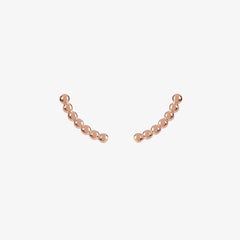 rose gold curved beaded ear climber stud earrings by matthew calvin on a white background