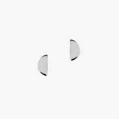 Silver disc shaped earrings on a white background