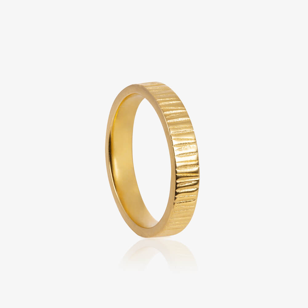 Close up of Doru Band ring in gold