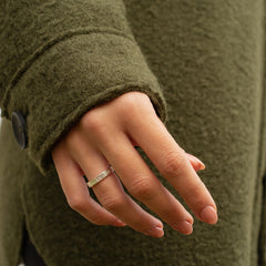 Model wearing textured Matthew Calvin ring