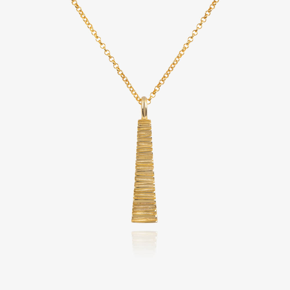 A tapered necklace by Matthew Calvin plated in gold
