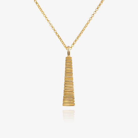 A tapered necklace by Matthew Calvin plated in gold