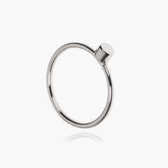 Sterling silver circle Matthew Calvin dot ring on a white background