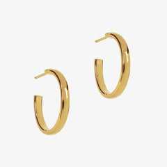 Large gold hoops on a white background