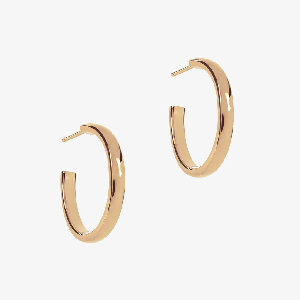 Rose gold plain hoops on a white background
