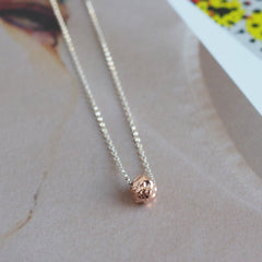 Meteorite style charm in rose gold on silver chain pendant by Matthew Calvin