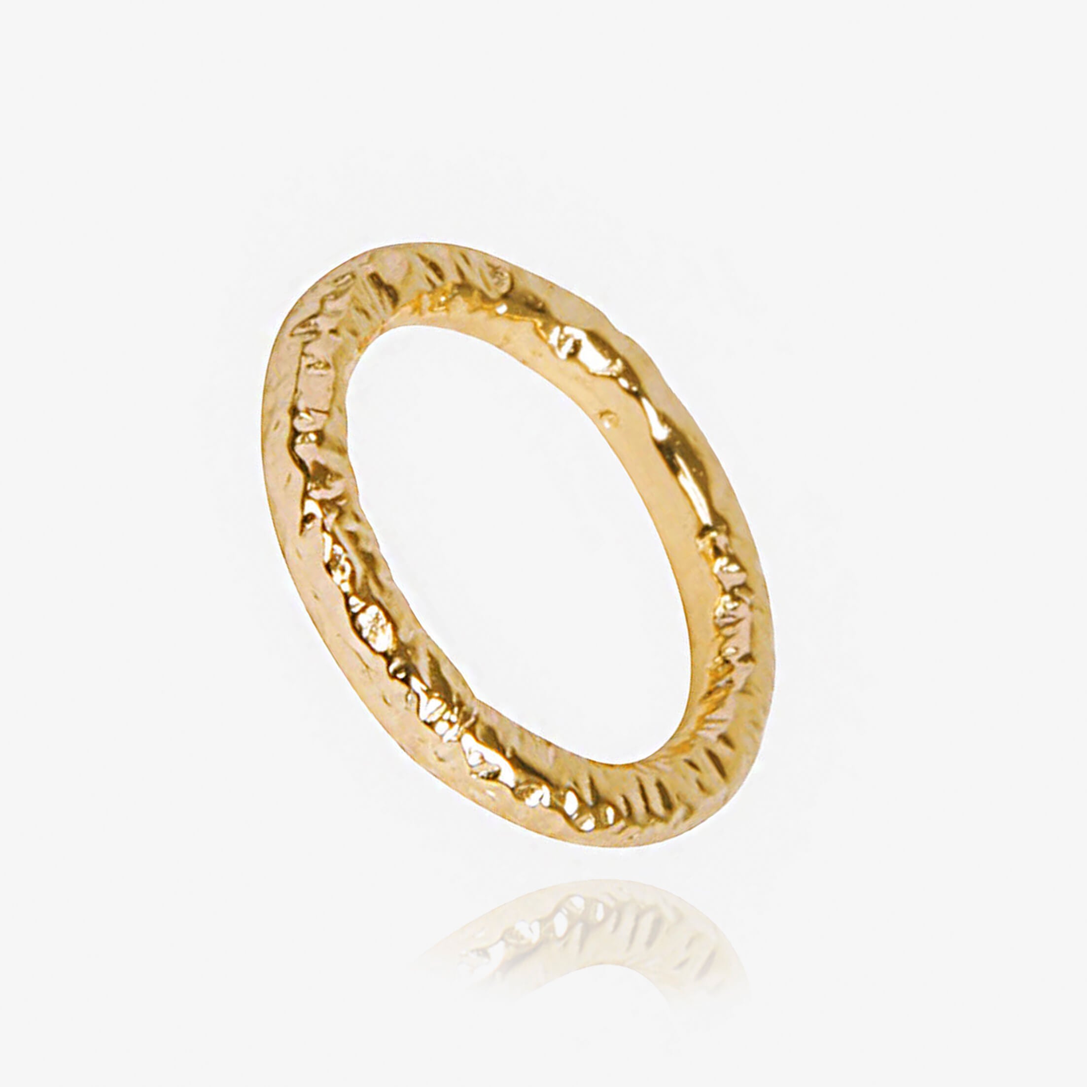 Thin ring with meteorite style texturing in gold