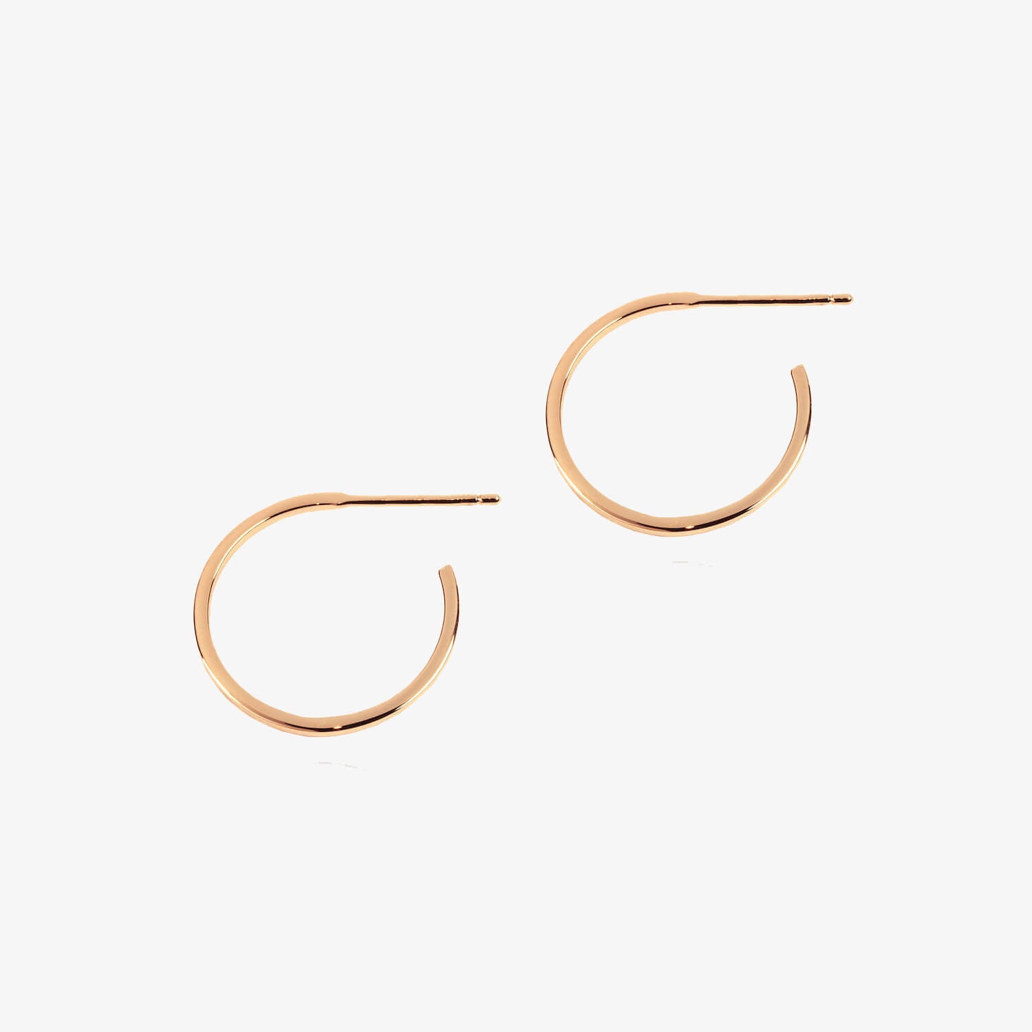 Rose gold Thin Wire Hoops on a white background